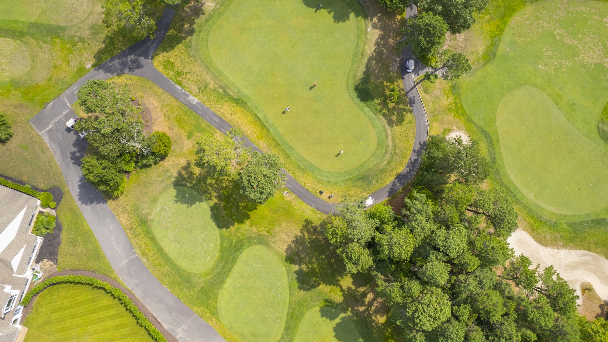 An aerial photo of the golf course at LBI National Golf Resort showing perfectly manicured greens