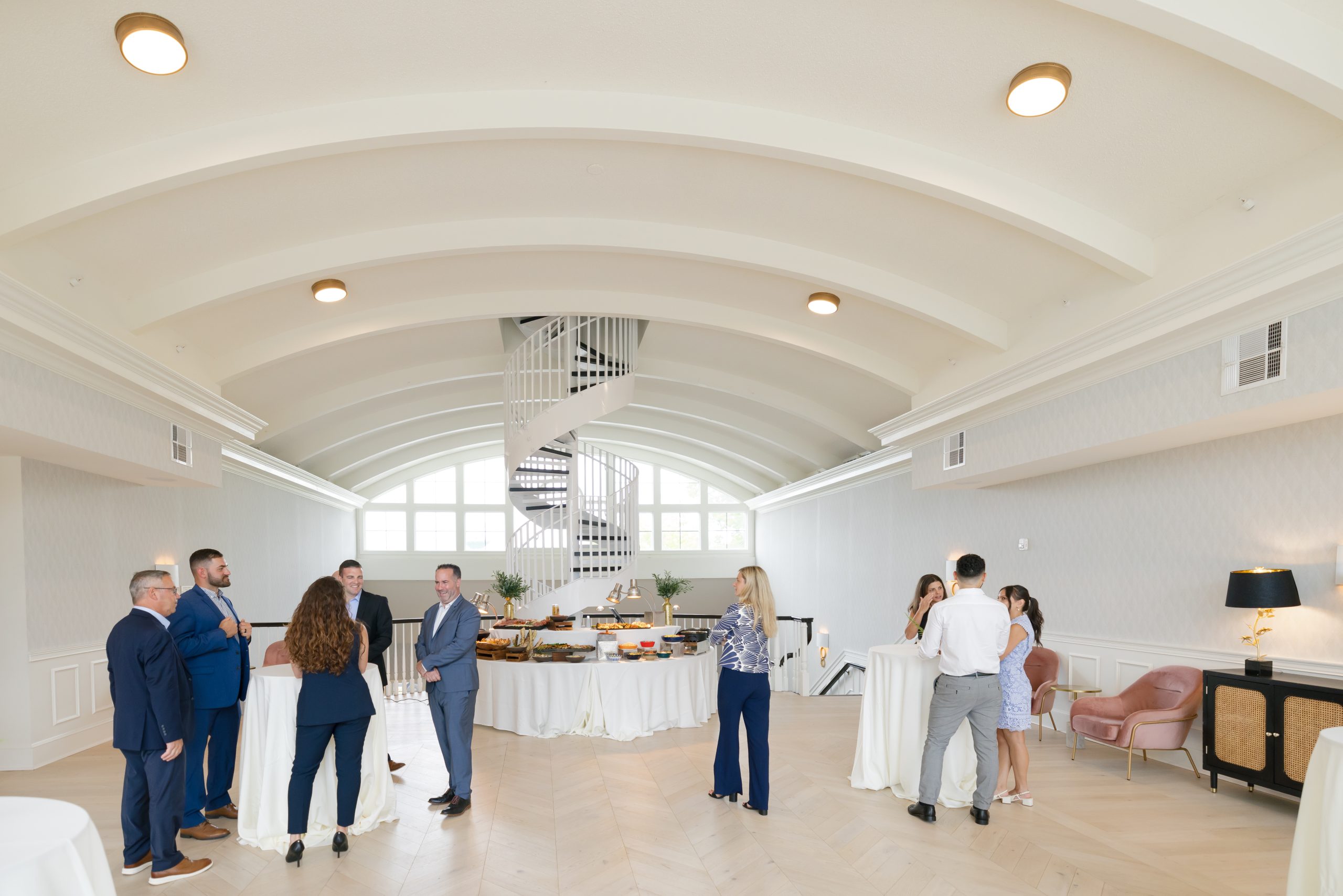 A corporate group during happy hour inside one of the meeting venues at LBI National