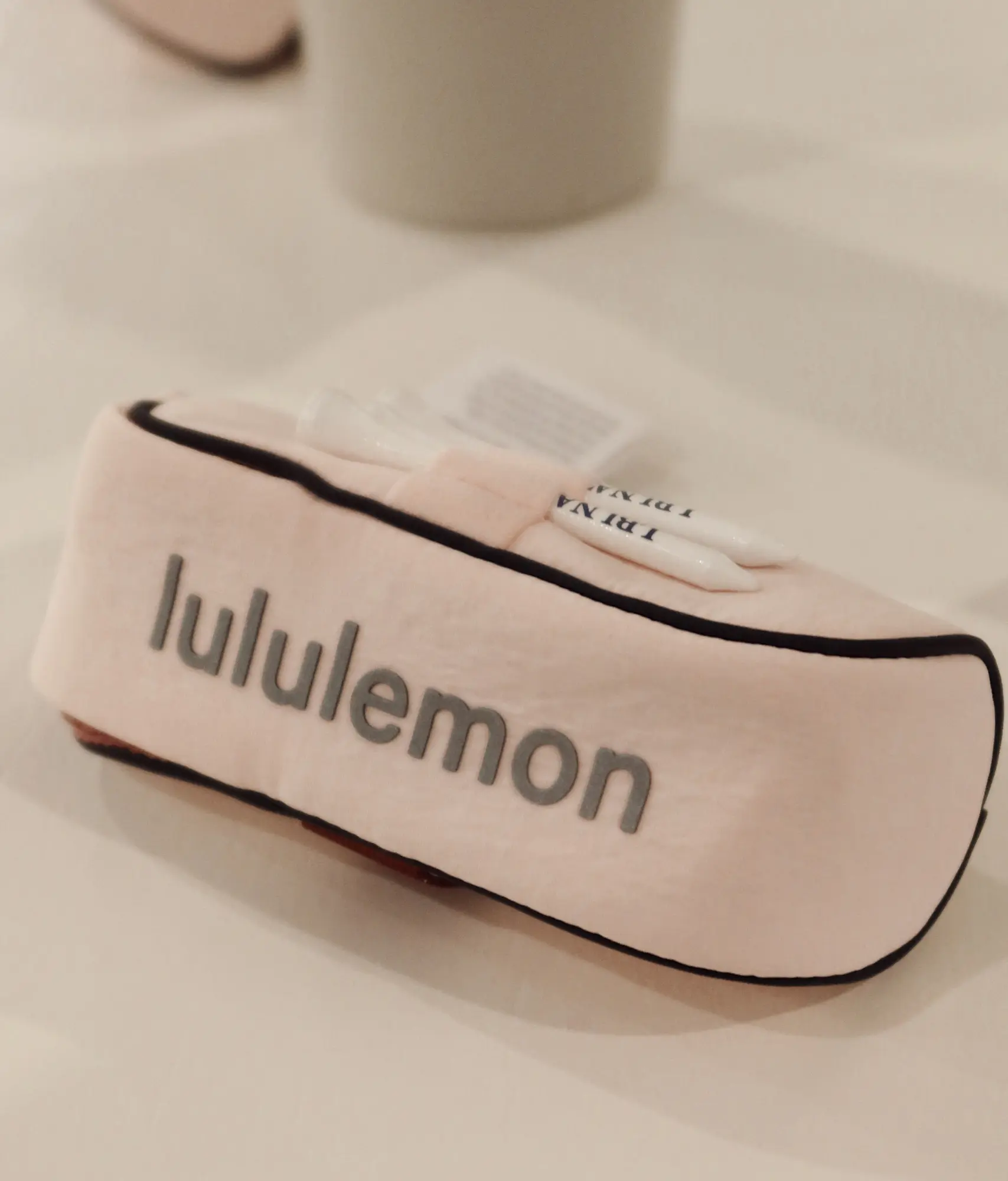 LBI National Golf & Resort pink lululemon belt bag displayed in the resort shop