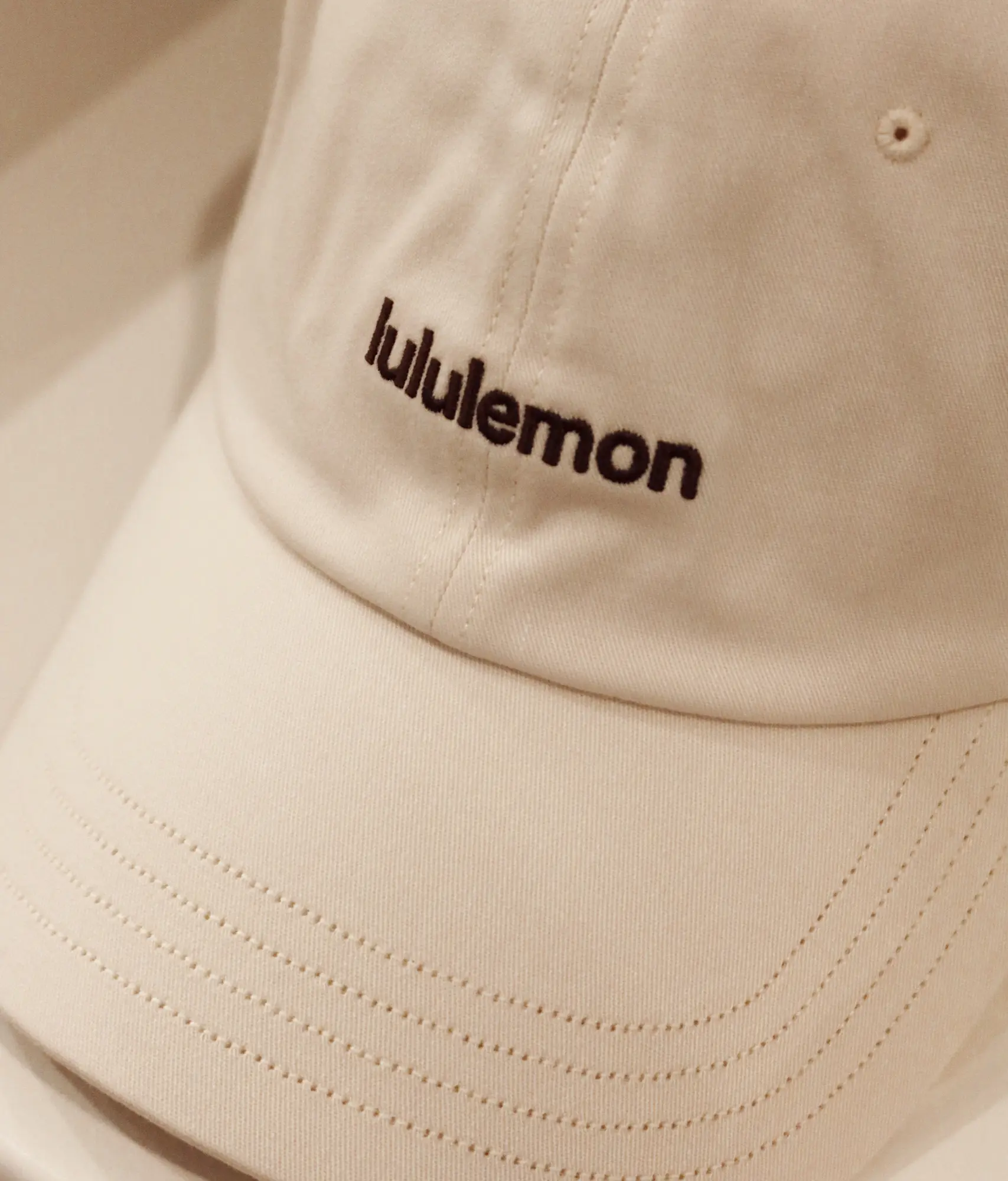 LBI National Golf & Resort white lululemon golf cap with embroidered logo